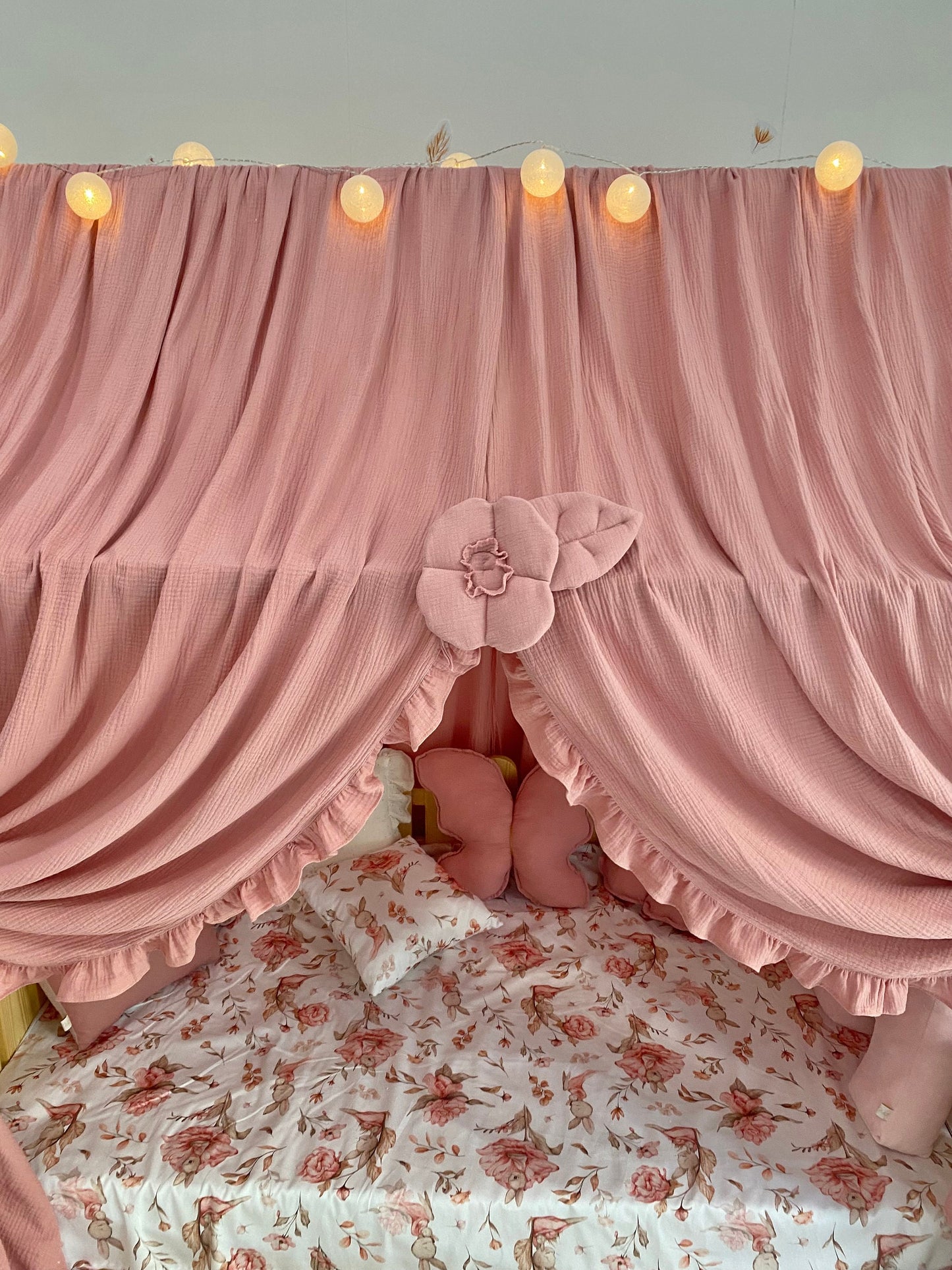 Boho girls reading nook with flower tiebacks