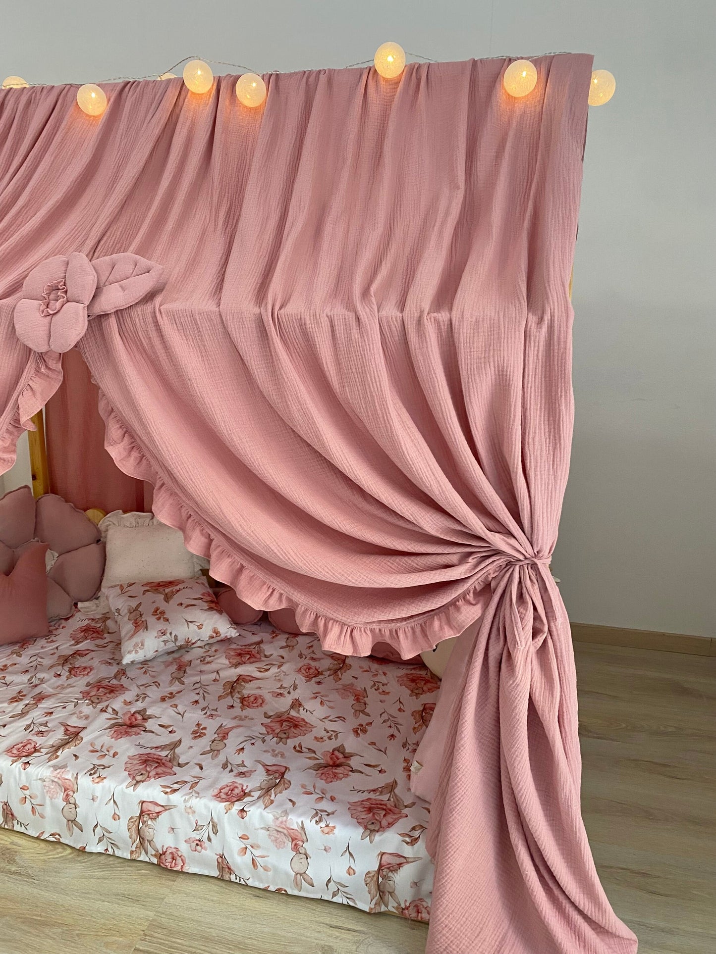 Boho girls reading nook with flower tiebacks